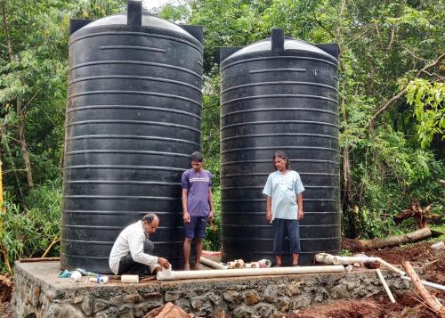 Water tanks at shower house